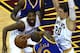 Golden State Warriors Andre Iguodala (C) is cornered by the Cleveland Cavaliers Timofey Mozgov (R) and Tristan Thompson (L) during Game 6 of the 2015 NBA Finals June 16, 2015 at the at Quicken Loans Arena in Cleveland, Ohio. AFP PHOTO / TIMOTHY A. CLARY