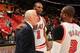 MIAMI, FL - FEBRUARY 9: Head coach Gregg Popovich of the San Antonio Spurs talks with Chris Bosh #1 of the Miami Heat and Dwyane Wade #3 of the Miami Heat after the game on February 9, 2016 at American Airlines Arena in Miami, Florida. NOTE TO USER: User