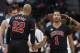 Taj Gibson and Derrick Rose
