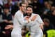 MADRID, SPAIN - JANUARY 09: Gareth Bale of Real Madrid (L) celebrates with team mate Daniel Carvajal as he scores their fourth goaland completes his hat trick during the La Liga match between Real Madrid CF and RC Deportivo La Coruna at Estadio Santiago