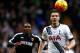 Wimmer focused and alert ahead of Watford's Odion Ighalo.