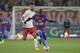 Paris' Argentine midfielder Javier Pastore (L) vies for the ball with Caen's French midfielder N'golo Kante during the French L1 football match between Caen (SM Caen) and Paris Saint-Germain (PSG), on September 24, 2014, at the Michel d'Ornano stadium, in