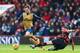 BOURNEMOUTH, ENGLAND - FEBRUARY 07: Aaron Ramsey of Arsenal is challenged by Andrew Surman of Bournemouth during the Barclays Premier League match between A.F.C. Bournemouth and Arsenal at the Vitality Stadium on February 7, 2016 in Bournemouth, England.