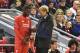 LIVERPOOL, ENGLAND - OCTOBER 22: Christian Benteke of Liverpool receives instructions from Jurgen Klopp the manager of Liverpool as he prepares to come on as a second half substitute during the UEFA Europa League Group B match between Liverpool FC and Ru