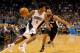 ORLANDO, FL - FEBRUARY 10: Elfrid Payton #4 of the Orlando Magic drives past Patty Mills #8 of the San Antonio Spurs during the game at Amway Center on February 10, 2016 in Orlando, Florida. NOTE TO USER: User expressly acknowledges and agrees that, by d