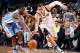 DALLAS, TX - NOVEMBER 28: Dwight Powell #7 of the Dallas Mavericks tries to keep the ball away from Kenneth Faried #35 of the Denver Nuggets on November 28, 2015 at the American Airlines Center in Dallas, Texas. NOTE TO USER: User expressly acknowledges a