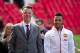 Dutch midfielder Memphis Depay (R) arrives with Manchester United's Dutch manager Louis van Gaal as he is officially unveiled as a Manchester United player at Old Trafford stadium in Manchester, north west England on July 10, 2015. Manchester United winge