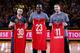 OAKLAND, CA - FEBRUARY 09: (L-R) Stephen Curry #30, Draymond Green #23 and Klay Thompson #11 of the Golden State Warriors hold up their respective All-Star jerseys before their game against the Houston Rockets at ORACLE Arena on February 9, 2016 in Oakla