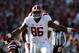 STARKVILLE, MS - NOVEMBER 14: A'Shawn Robinson #86 of the Alabama Crimson Tide reacts after sacking Dak Prescott #15 of the Mississippi State Bulldogs on the first play of the game at Davis Wade Stadium on November 14, 2015 in Starkville, Mississippi. (