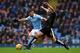 MANCHESTER, ENGLAND - FEBRUARY 06: Sergio Aguero of Manchester City and Danny Drinkwater of Leicester City compete for the ball during the Barclays Premier League match between Manchester City and Leicester City at the Etihad Stadium on February 6, 2016 i