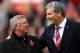 MANCHESTER, ENGLAND - NOVEMBER 05: Chief Executive David Gill (r) announces the name changing of the North Stand to the 'Sir Alex Ferguson Stand' to commemerate Sir Alex's 25th year as Manager during the Barclays Premier League match between Manchester U