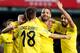 Villarreal's forward Roberto Soldado (2nd R) celebrates a goal with teammates during the Spanish league football match Villarreal CF vs Malaga CF at the at El Madrigal stadium in Vila-real on February 13, 2016. / AFP / Jose Jordan (Photo credit sho