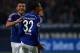 Schalke's defender Sead Kolasinac and Schalke's Cameroonian defender Joel Matip celebrate during the German first division Bundesliga football match FC Schalke 04 v Eintracht Frankfurt in Gelsenkirchen, on September 23, 2015. AFP PHOTO / PATRIK STOLLAR