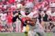 Jan 1, 2016; Glendale, AZ, USA; Ohio State Buckeyes running back Ezekiel Elliott (15) carries the ball during the second half against the Notre Dame Fighting Irish in the 2016 Fiesta Bowl at University of Phoenix Stadium. Mandatory Credit: Matt Kartozian-