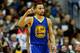 WASHINGTON, DC - FEBRUARY 03: Stephen Curry #30 of the Golden State Warriors celebrates after scoring in the foiurth quarter against the Washington Wizards at Verizon Center on February 3, 2016 in Washington, DC. The Warriors defeated the Wizards 134 to