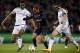 Paris Saint-Germain's Brazilian midfielder Lucas Moura (C) vies for the ball with Chelsea's Nigerian midfielder John Obi Mikel (L) and Chelsea's Spanish defender Cesar Azpilicueta (R) during the Champions League round of 16 first leg football match betwee