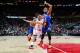 ATLANTA, GA - JANUARY 5: Jeff Teague #0 of the Atlanta Hawks drives passed Derrick Williams #23 of the New York Knicks during the game on January 5, 2016 at Philips Arena in Atlanta, Georgia. NOTE TO USER: User expressly acknowledges and agrees that, by d