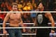 NEW YORK, NY - AUGUST 23: Dean Ambrose and Roman Reigns celebrate their victory at the WWE SummerSlam 2015 at Barclays Center of Brooklyn on August 23, 2015 in New York City. (Photo by JP Yim/Getty Images)
