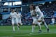 Liverpool's English defender Nathaniel Clyne (R) celebrates scoring his team's fifth goal with Liverpool's Brazilian midfielder Roberto Firmino (2R) and Liverpool's English midfielder James Milner (L) during the English Premier League football match betwe
