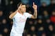 Liverpool's Brazilian midfielder Philippe Coutinho celebrates after scoring their first goal during the English FA Cup fourth round replay football match between West Ham United and Liverpool at The Boleyn Ground in Upton Park, east London, on February 9,