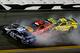 DAYTONA BEACH, FL - FEBRUARY 18: Jimmie Johnson, driver of the #48 Lowe's Chevrolet, Martin Truex Jr., driver of the #78 Bass Pro Shops/Tracker Boats Toyota, and Matt Kenseth, driver of the #20 Dollar General Toyota, have an on track incident during the