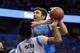 Feb 19, 2016; Orlando, FL, USA; Orlando Magic guard Elfrid Payton (4) defends a shot by Dallas Mavericks center Zaza Pachulia (27) during the first quarter at Amway Center. Mandatory Credit: Kim Klement-USA TODAY Sports