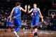BROOKLYN, NY - FEBRUARY 19: Kristaps Porzingis #6 celebrates with Robin Lopez #8 of the New York Knicks against the Brooklyn Nets on February 19, 2016 at Barclays Center in Brooklyn, New York. NOTE TO USER: User expressly acknowledges and agrees that, by
