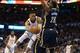 Feb 19, 2016; Oklahoma City, OK, USA; Oklahoma City Thunder guard Russell Westbrook (0) passes the ball behind Indiana Pacers center Ian Mahinmi (28) during the first quarter at Chesapeake Energy Arena. Mandatory Credit: Mark D. Smith-USA TODAY Sports