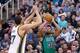 Feb 19, 2016; Salt Lake City, UT, USA; Boston Celtics guard Marcus Smart (36) shoots the ball against Utah Jazz center Rudy Gobert (27) during the first half at Vivint Smart Home Arena. Mandatory Credit: Russ Isabella-USA TODAY Sports