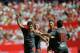 Celta Vigo's forward Nolito (L) celebrates a goal with teammates during the Spanish league football match Sevilla FC vs Celta de Vigo at the Ramon Sanchez Pizjuan stadium in Sevilla on September 20, 2015. AFP PHOTO/ CRISTINA QUICLER (Photo credit