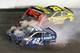 DAYTONA BEACH, FL - FEBRUARY 18: Jimmie Johnson, driver of the #48 Lowe's Chevrolet, Martin Truex Jr., driver of the #78 Bass Pro Shops/Tracker Boats Toyota, and Matt Kenseth, driver of the #20 Dollar General Toyota, have an on track incident during the