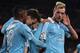 Celta's Swedish forward John Guidetti celebrates his goal with teammates during the Spanish league football match FC Barcelona vs RC Celta de Vigo at the Camp Nou stadium in Barcelona on February 14, 2016.
/ AFP / JOSEP LAGO (Photo credit should