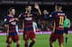 TOPSHOT - Barcelona's Brazilian forward Neymar (R) celebrates his goal with Barcelona's Argentinian forward Lionel Messi (L) and Barcelona's Uruguayan forward Luis Suarez during the Spanish league football match FC Barcelona vs RC Celta de Vigo at the Cam