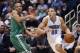 Jan 31, 2016; Orlando, FL, USA; Orlando Magic forward Aaron Gordon (00) drives past Boston Celtics guard Avery Bradley (0) during the second half of a basketball game at Amway Center. The Magic won 119-114. Mandatory Credit: Reinhold Matay-USA TODAY Sport