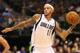 DALLAS, TX - OCTOBER 17: Delonte West #13 of the Dallas Mavericks passes the ball against the Phoenix Suns during a preseason game at American Airlines Center on October 17, 2012 in Dallas, Texas. NOTE TO USER: User expressly acknowledges and agrees that