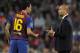 Barcelona's coach Josep Guardiola (R) talks with Barcelona's midfielder Sergio Busquets (L) during the Champions League football match between FC Barcelona and Viktoria Plzen at the Camp Nou stadium in Barcelona on October 19, 2011. AFP PHOTO/LLUIS GENE (
