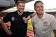 Liverpool's English captain and midfielder Steven Gerrard (L) and former Liverpool team mate Jamie Carragher attend a press conference at Anfield in Liverpool, north west England on March 12, 2015 ahead of an All-Star charity match at the stadium on March
