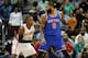 Dec 26, 2015; Atlanta, GA, USA; Atlanta Hawks forward Paul Millsap (4) defends New York Knicks forward Kyle O'Quinn (9) in the fourth quarter at Philips Arena. The Hawks defeated the Knicks 117-98. Mandatory Credit: Brett Davis-USA TODAY Sports