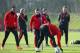 MANCHESTER, ENGLAND - FEBRUARY 24: Louis van Gaal manager of Manchester United (R) watches players warm up during a Manchester United training session ahead of their UEFA Europa League round of 32 second leg match against FC Midtjylland at the Aon Traini