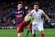 Barcelona's Argentinian forward Lionel Messi (L) vies with Sevilla's French defender Timothee Kolodziejczak during the Spanish league football match FC Barcelona vs Sevilla FC at the Camp Nou stadium in Barcelona on February 28, 2016. / AFP / JOSEP LAGO