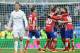 MADRID, SPAIN - FEBRUARY 27: Cristiano Ronaldo of Real Madrid walks away from celebrating Atletico Madrid players after Atletico beat Real 1-0 in the La Liga match between Real Madrid CF and Club Atletico de Madrid at Estadio Santiago Bernabeu on Februar