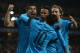 LONDON, ENGLAND - FEBRUARY 23: Lionel Messi of Barcelona celebrates with Luis Suarez and Neymar of Barcelona after scoring the first goal during the UEFA Champions League round of 16 first leg match between Arsenal and Barcelona on February 23, 2016 in L
