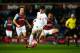LONDON, ENGLAND - FEBRUARY 09: Joao Carlos Teixeira of Liverpool evades Mark Noble (L) and Winston Reid of West Ham United during the Emirates FA Cup Fourth Round Replay match between West Ham United and Liverpool at Boleyn Ground on February 9, 2016 in