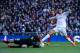 MADRID, SPAIN - FEBRUARY 27: Goalkeeper Jan Oblak (L) of Atletico de Madrid stops the ball striked by Cristiano Ronaldo (R) of Real Madrid CF during the La Liga match between Real Madrid CF and Club Atletico de Madrid at Estadio Santiago Bernabeu on Febru