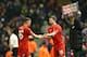 LIVERPOOL, ENGLAND - JANUARY 20: Jon Flanagan of Liverpool (c) replaces Connor Randall of Liverpool during The Emirates FA Cup Third Round Replay match between Liverpool and Exeter City at Anfield on January 20, 2016 in Liverpool, England. (Photo by Cli
