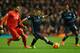 LIVERPOOL, ENGLAND - MARCH 02: Emre Can of Liverpool challenges Sergio Aguero of Manchester City during the Barclays Premier League match between Liverpool and Manchester City at Anfield on March 2, 2016 in Liverpool, England. (Photo by Clive Brunskill