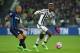 TURIN, ITALY - FEBRUARY 28: Paul Pogba (R) of Juventus FC in action against Felipe Melo of FC Internazionale Milano during the Serie A match between Juventus FC and FC Internazionale Milano at Juventus Arena on February 28, 2016 in Turin, Italy. (Photo