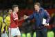 Manchester United's Dutch manager Louis van Gaal (R) shakes hands with Manchester United's Uruguayan defender Guillermo Varela (L) at the end of the English Premier League football match between Manchester United and Watford at Old Trafford in Manchester