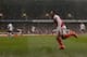 Arsenal's Chilean striker Alexis Sanchez (R) celebrates after scoring their second goal during the English Premier League football match between Tottenham Hotspur and Arsenal at White Hart Lane in London, on March 5, 2016. / AFP / ADRIAN DENNIS / RESTRICT