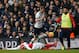 Tottenham Hotspur's English striker Harry Kane is foulded by Arsenal's French midfielder Francis Coquelin (L) which leads to Francis Coquelin receiving a second yellow card during the English Premier League football match between Tottenham Hotspur and Ar